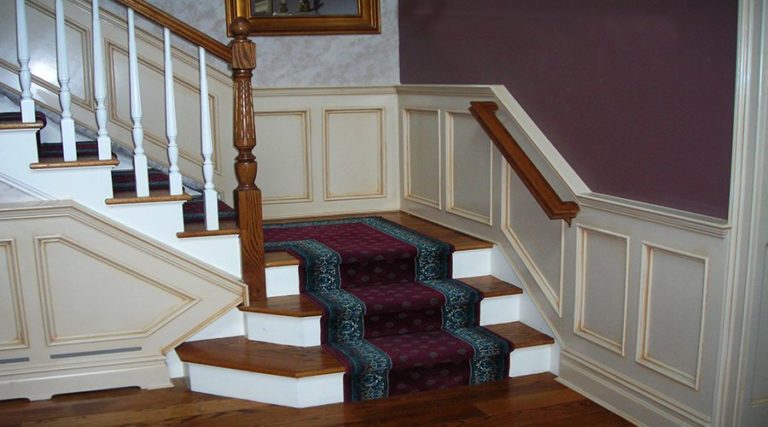 Recessed panel wainscot on staircase