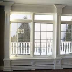 Low wainscot window treatment with concealed heat