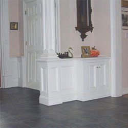 wainscot divider with built-in cabinet and column