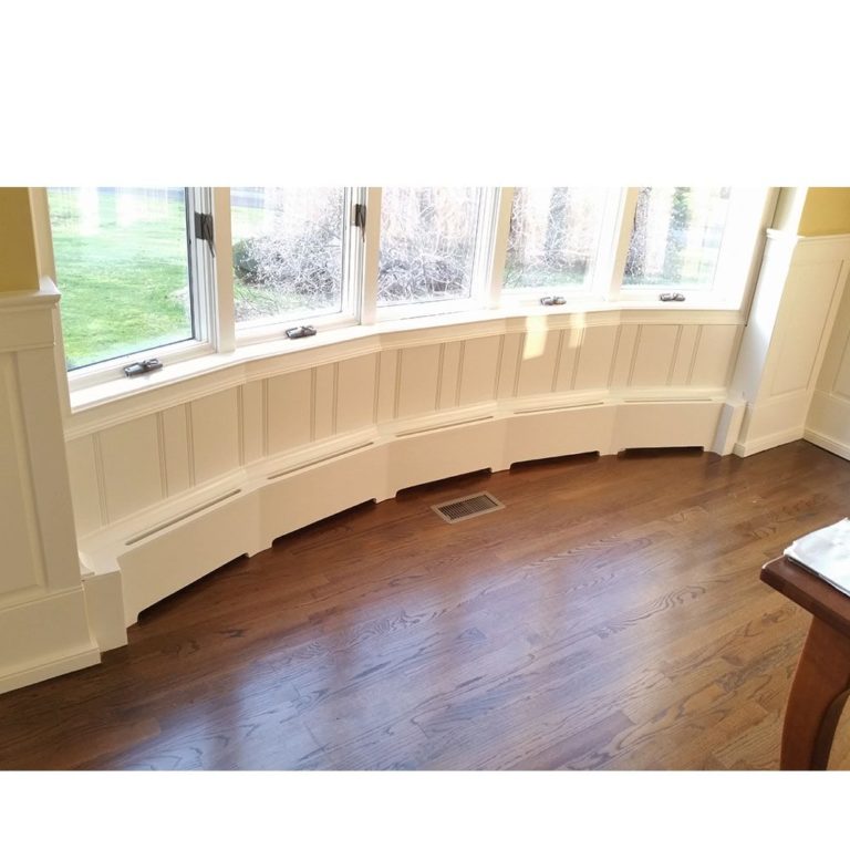 Custom Wood Baseboard Heater Covers under Bow Window