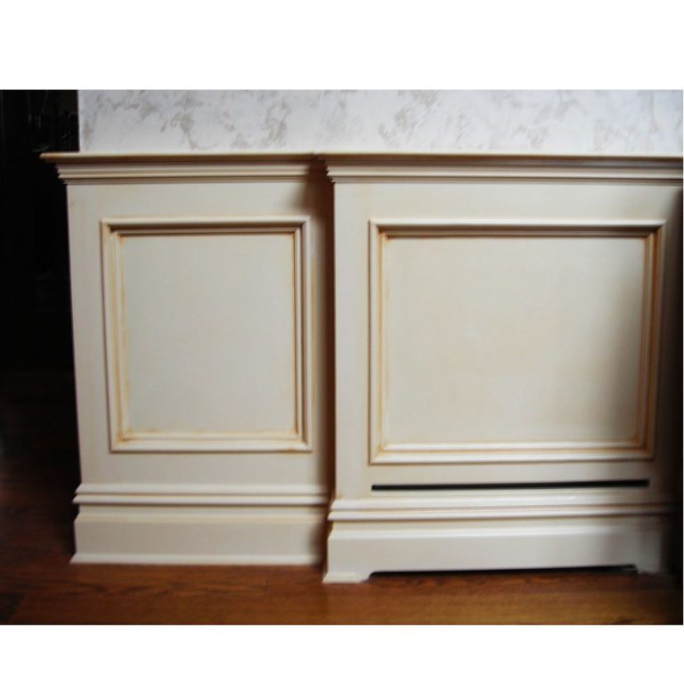 Custom Wood Baseboard Heater Covers conceal the heater behind Panelwork