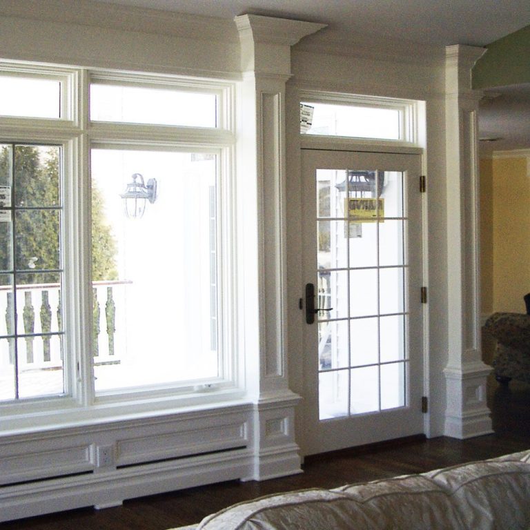 Custom Wood Baseboard Heater Covers conceal the heater behind Panelwork