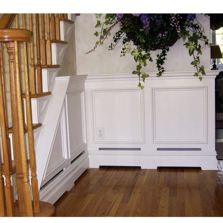 Custom Wood Baseboard Heater Covers conceal the heater behind Panelwork