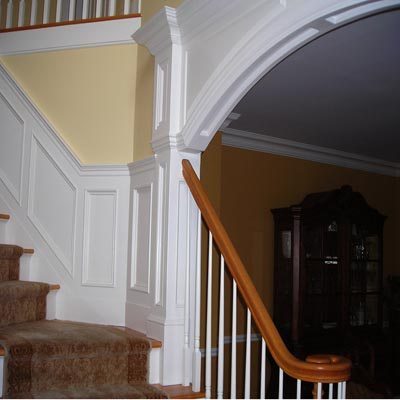 Paneled Round Archway at Staircase