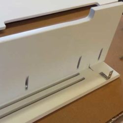 Assembled section of a wood baseboard heater cover