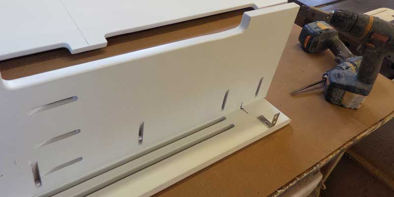 Assembled section of a wood baseboard heater cover